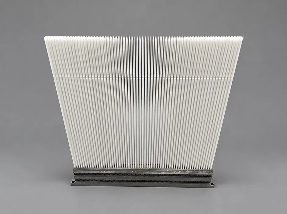 A row of thin white blades standing in a metal base channel on a grey studio ground.